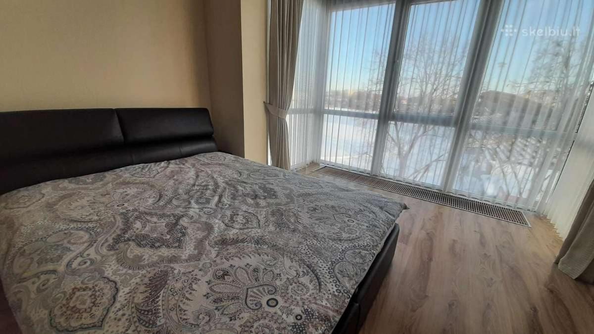 Апартаменты Jaukus Apartamentai Шяуляй Экстерьер фото