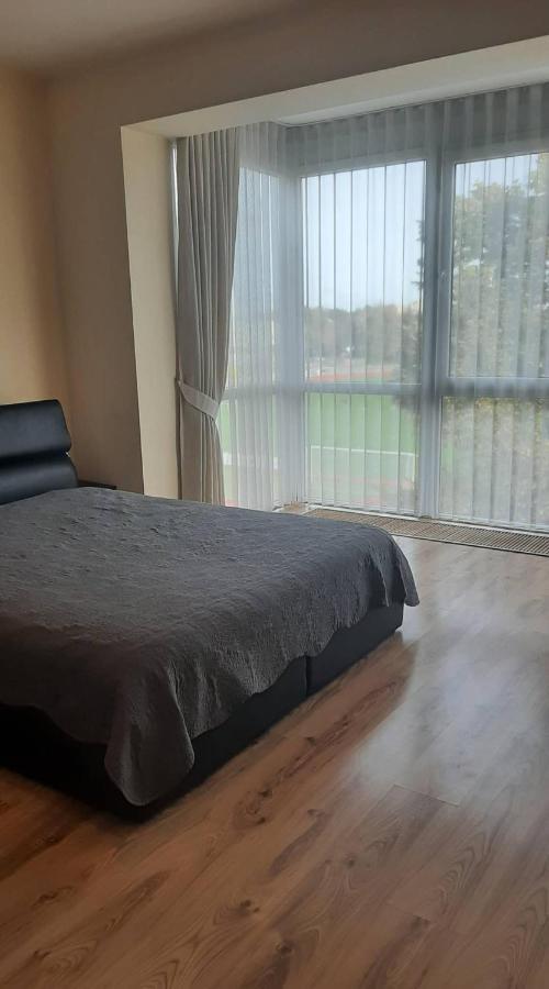 Апартаменты Jaukus Apartamentai Шяуляй Экстерьер фото